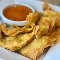 Crispy Chicken Wonton · Crispy homemade Thai dumplings with minced chicken filling. Comes with sweet chili sauce (sa...