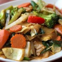 Drunken Noodles · Wide rice noodles stir-fried with green chili pepper, basil, onion, red bell pepper, tomato ...