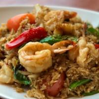 Basil Fried Rice · Jasmine rice stir-fried with green chili pepper, basil, onion, red bell pepper, tomato and c...
