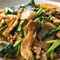 Pad See Ew · Wide rice noodles stir-fried with black bean sauce, egg, Chinese broccoli and choice of prot...