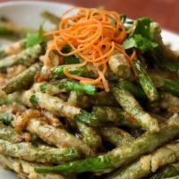 Crispy String Beans · Mild Spicy.  Hand battered string beans with garlic and chili.