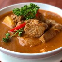 Massamun Curry · Mild Spicy.  Potatoes, onions, peanuts and coconut milk in curry sauce with choice of Chicke...