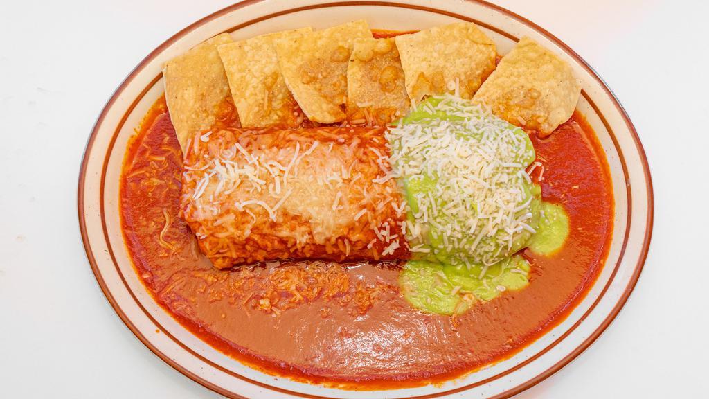 Burrito Mojado · Favorite. Choice of meat burrito served with rice, beans, onions or cilantro, and hot sauce. Burrito is smothered in sauce and cheese.