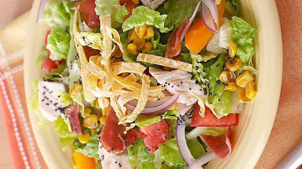 Turkey Salad · Sliced oven roasted turkey breast, crispy lettuce, tomatoes, cucumbers, onions, and green peppers.