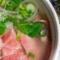 Seafood – Pho Noodle Soup · Large seafood phở noodle soup in chicken broth including shrimps, squids, scallops, fish balls