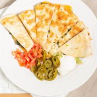 Spinach Quesadilla · Served with guacamole, sour cream, tomatoes and jalapenos.