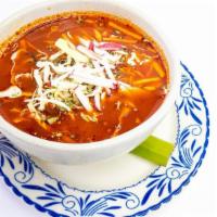Pozole Rojo · traditional pre-hispanic soup with pork, red guajillo broth, hominy, green cabbage, red radi...