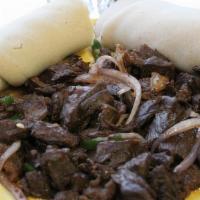 Lega Tibs · Medium rare to well done beef chunks lightly cooked with fresh herb, spices, onions and jala...