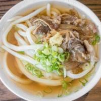 Niku Soup · Hand-made udon noodles served in our signature dashi broth and topped with savory sukiyaki b...