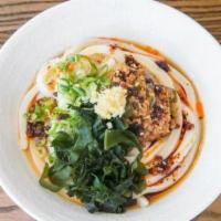 Tan Tan Sauce · Hand-made udon noodles lightly dressed with our signature dashi soy sauce and topped with ou...
