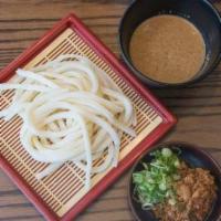 Tan Tan Goma Zaru · Hand-made udon noodles served with our signature roasted sesame dipping sauce paired with ou...