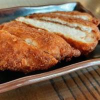 Tonkatsu (Pork Cutlet) · Panko breaded and fried pork loin cutlet.