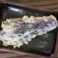Eggplant Tempura (1 Piece) · Tempura fried Japanese eggplant.