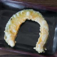 Kabocha Pumpkin Tempura (1 Piece) · Japanese sweet pumpkin tempura.