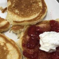 Buttermilk Pancakes · Add topping for an additional charges.