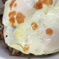 Meat Lovers Bowl · Hash browns, bacon, sausage, ham. cheddar cheese topped with two eggs.
