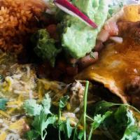 Chile Verde Carnitas Plate · Carnitas topped with tomatillo sauce and cheese. Served with guacamole, salsa fresca and cor...