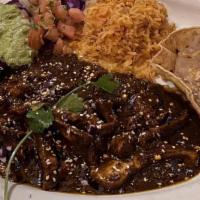 Bistec Ranchero Plate · Sirloin steak, bell pepper, tomato and onion sauteed in ranchero sauce, served with corn and...
