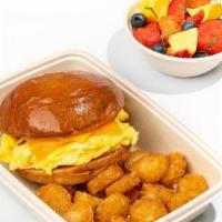 Kid'S Egg & Cheese · Scrambled Egg, American & Cheddar cheese, Fruit Cup, Hash Brown Patty