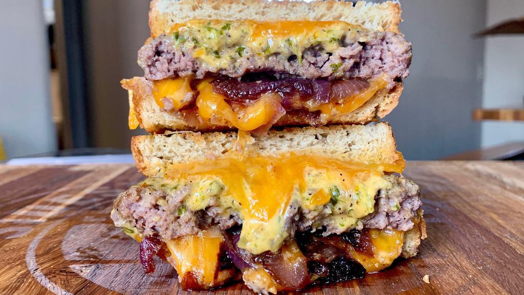 Watchu Talkin' Bout Patty Melt · Willis's favorite sandwich! 1/3 lb patty sandwiched between toasted Texas rye bread with melty cheese, sauteed onions, and a house made comeback sauce!