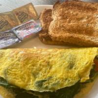 Vegetable Omelet · Spinach, tomato, green pepper, onion and provolone cheese omelet.  Toast with butter and jam...