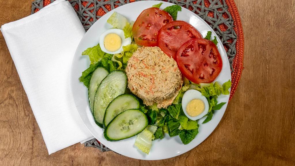 Chicken Salad  Plate · The Famous Chicken Salad on a bed of Lettuce with Tomato, Cucumber, Boiled Egg with Honey Mustard or Italian Dressing
