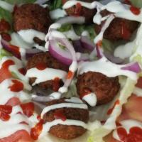Falafel. Wrap · Vegetarian .Come with Tomato, Lettuce, Onion, White Sauce (Mayo with Garlic) & Hot Sauce