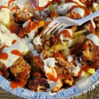 Chicken Shawarma Over Fries Or Rice · Come with Tomato, Lettuce, Onion, White Sauce (Mayo with Garlic) & Hot Sauce