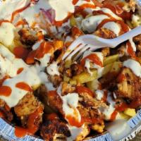 Beef Shawarma Platter Over Rice Or Fries  · Come with Tomato, Lettuce, Onion, White Sauce (Mayo with Garlic) & Hot Sauce