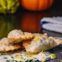 Spin Dip Pierogi (Vegetarian) · Classic Spinach Artichoke Dip with hints of Lemon and Garlic. We were tired of having partie...