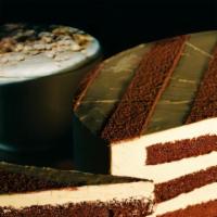 Cappuccino Cake · Alternating layers of espresso drenched chocolate sponge cake and coffee cream, decorated wi...