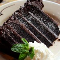 Death By Chocolate Cake · Super rich chocolate mousse layered between dense chocolate cake, covered with chocolate and...