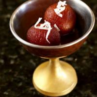 Gulab Jamun · ( Nepalese delicacy made wit
special dough, fried golden brown,
served in sugar syrup)