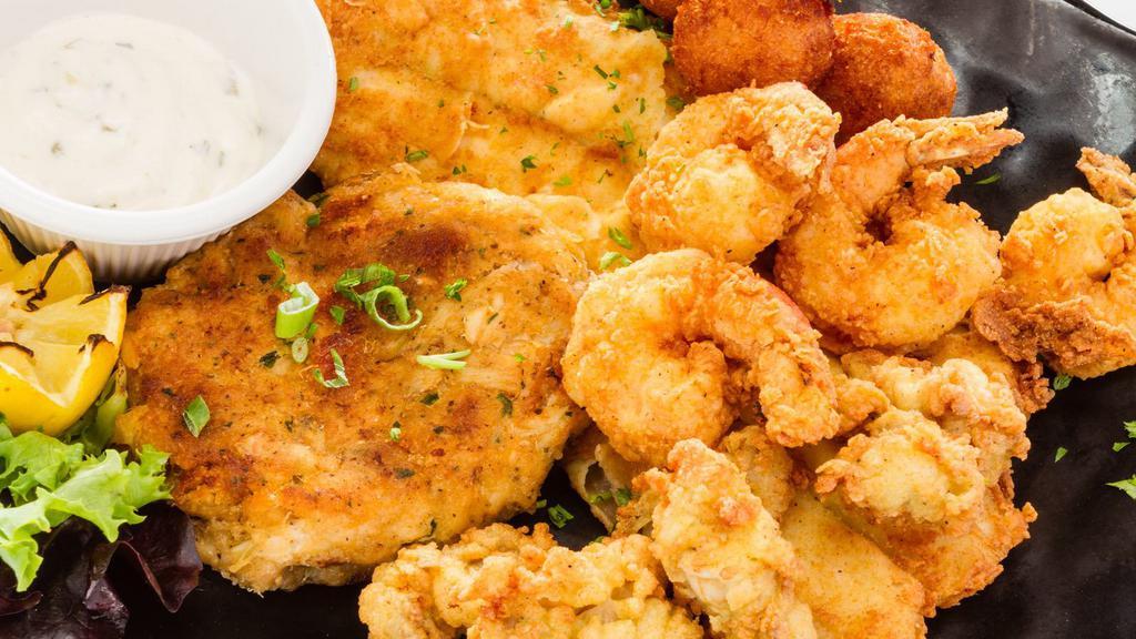 Fried Shrimp And Fish Plate · Three crispy, fried shrimp and two pieces of fried fish served with your choice of french fries, rice, toast, or salad.