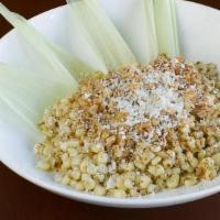 Esquite · A bed of fire of roasted corn off the cob sauteed in our chef's special garlic aioli sauce s...
