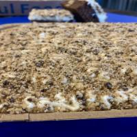 Cookie Stuffed Chocolate Cake ( Single Layer 1/4 Sheet) · Cookie stuffed cake with cream cheese icing and cookie crumbles