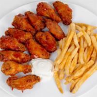 Wings · Choice of Buffalo, Mango Habanero, or Lemon Peper sauce. Served with a side of fries and ran...