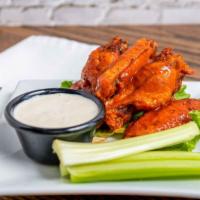 Chicken Wings · Buffalo or BBQ. Blue cheese or Ranch