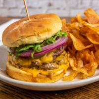 The Big Mick · Two all beef patties, thousand island, american cheese, lettuce, pickles, red onion, potato ...