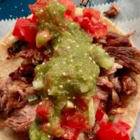 Carnitas  · traditional Michoacan style PORK carnitas, pico de gallo, salsa verde on double tortilla, pr...