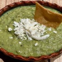 Guacamole · Signature Green Blend of  crushed premium MICHOACAN AVOCADO, fire roasted green tomatoes, ch...