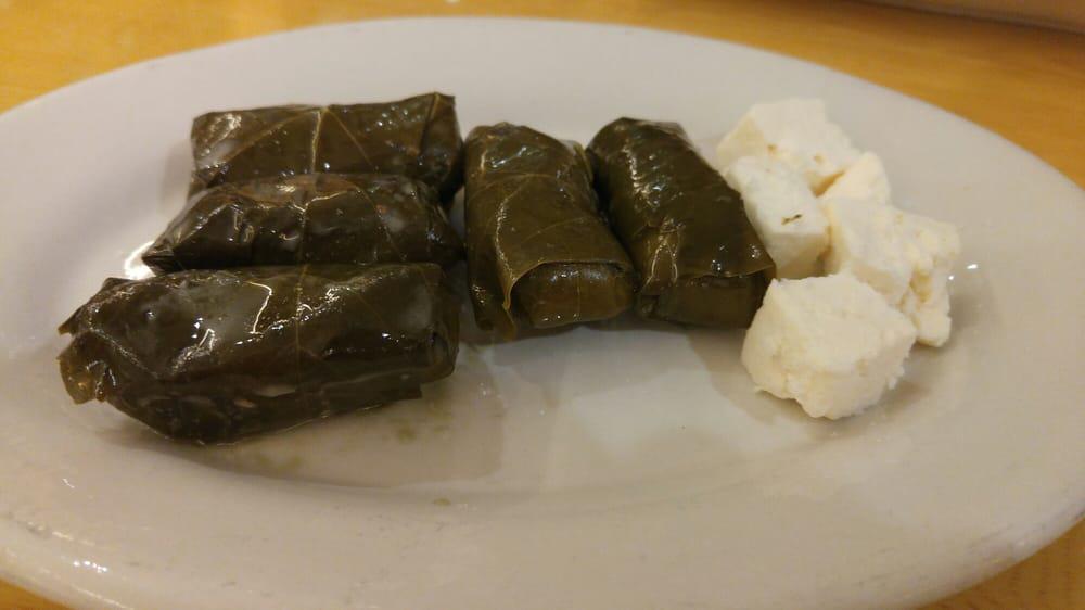 Grape Leaves (5 Pieces) · Gluten-free and vegan. Grape leaves stuffed with rice, onions, lemon juice and parsley cooked in olive oil. Add feta cheese for an additional charge.