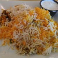 Chicken Biryani · Chicken cooked into a spicy sauce and layered in basmati rice then baked with a blend of dec...