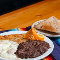 Hamburger Steak & Eggs · A 10 oz ground beef patty, grilled to order with 2 eggs cooked your way, hash browns or home...