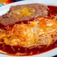 Huevos Rancheros · Includes your choice of red or green chile.