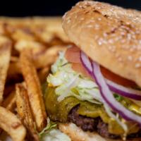 Cheeseburger · Served with fries, potato chips or salad.