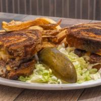 Patty Melt · Served on rye toast with American cheese, Swiss cheese & grilled onions.