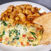 Grecian Omelette · Spinach, feta cheese and tomatoes.