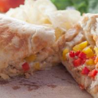 Chicken Fajita Sandwick · Our traditional toasted bun is overloaded with grilled chicken, red and yellow peppers, topp...