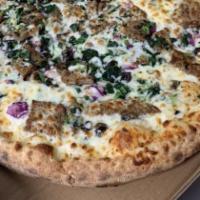 Greek Pizza · Gyro meat, tzatziki sauce, spinach, red onions, black olives, tomatoes, feta cheese with fre...